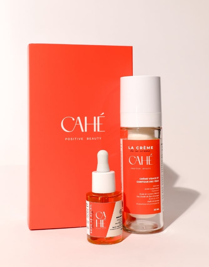 Coffret Duo Soin Cahé : Crème de la Crème et Huile Beauté Sous le Soleil présentés dans une élégante boîte à tiroir floquée, pour une peau hydratée, éclatante et protégée, adaptée à tous les types de peau.